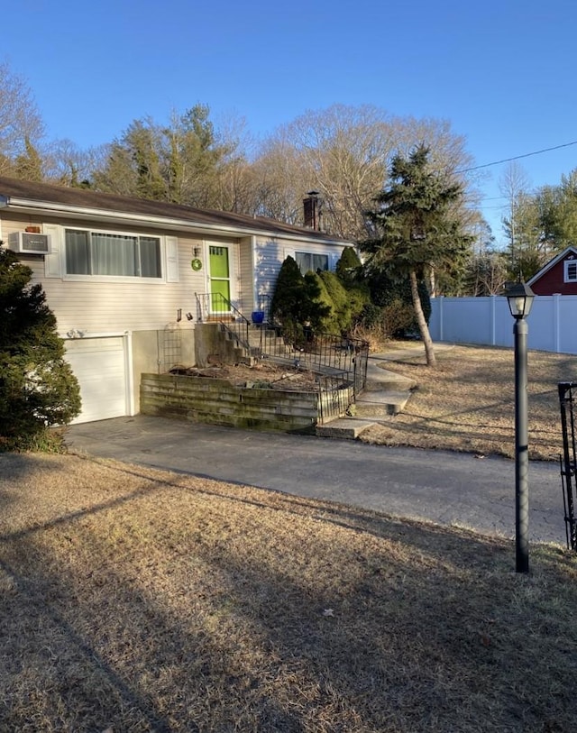 433 Browns Rd, Nesconset, NY 11767 - view of front of house with an attached garage and driveway