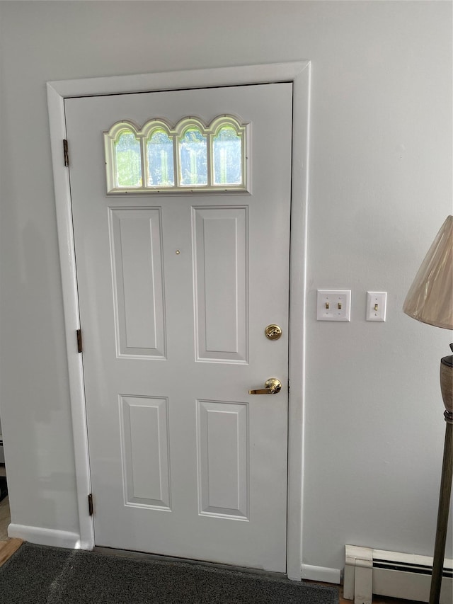433 Browns Rd, Nesconset, NY 11767 - entrance foyer featuring a baseboard heating unit