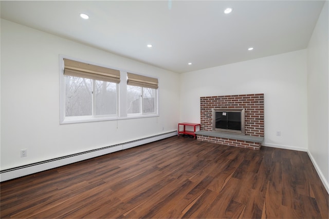 unfurnished living room featuring a fireplace, recessed lighting, baseboards, wood finished floors, and a baseboard radiator