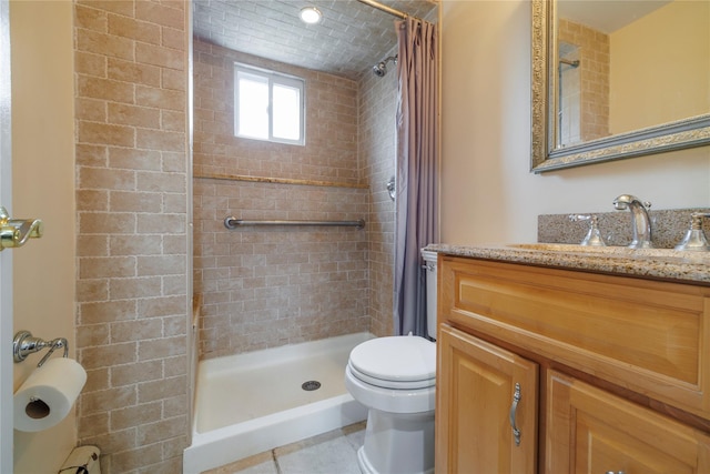 full bath featuring vanity, tile patterned flooring, a shower stall, and toilet