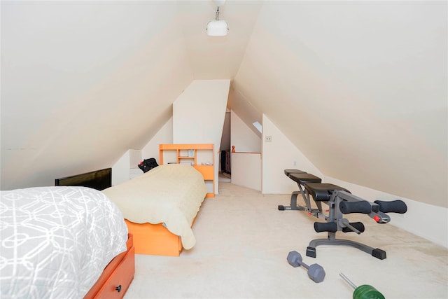 bedroom with lofted ceiling and carpet flooring