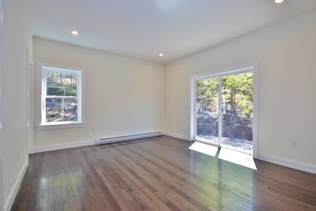 1211 Gulf Rd, Livingston Manor, NY 12724 - unfurnished room with a baseboard heating unit, plenty of natural light, dark wood-style floors, and recessed lighting