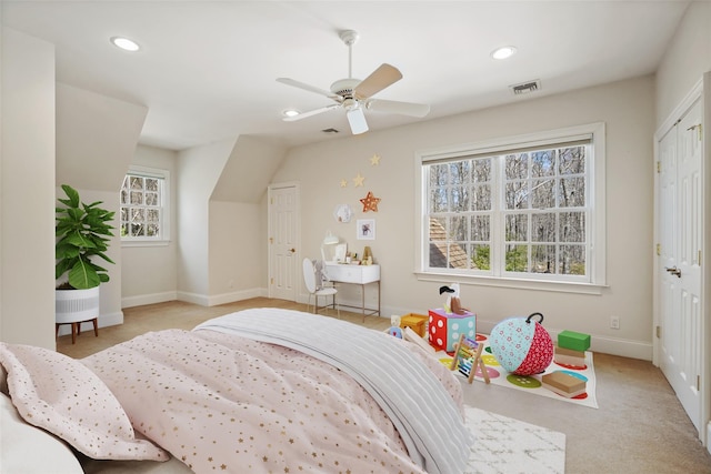carpeted bedroom featuring baseboards, ceiling fan, recessed lighting, and visible vents