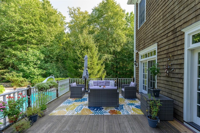 wooden terrace featuring an outdoor living space