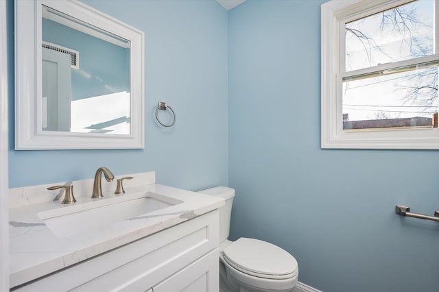 98 S 36th St, Wyandanch, NY 11798 - half bath with vanity, toilet, and visible vents