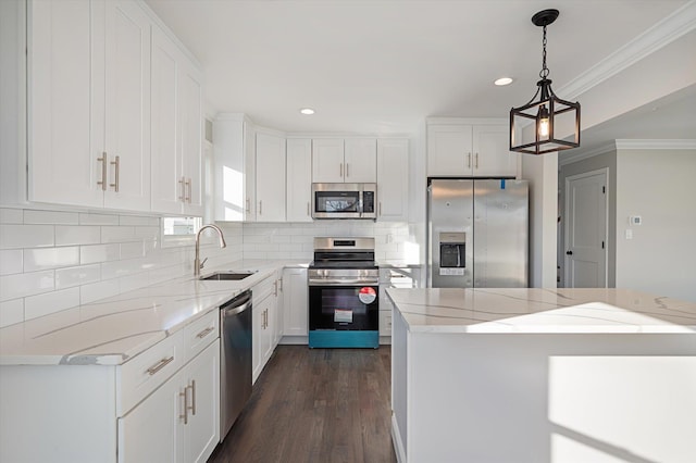 98 S 36th St, Wyandanch, NY 11798 - kitchen with crown molding, decorative backsplash, appliances with stainless steel finishes, white cabinetry, and a sink