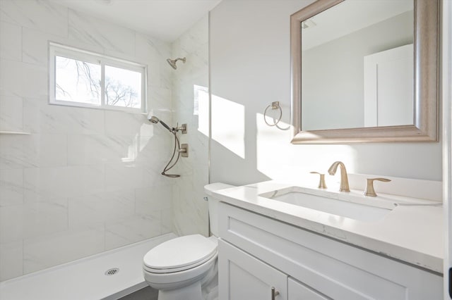 98 S 36th St, Wyandanch, NY 11798 - full bathroom featuring a tile shower, toilet, and vanity