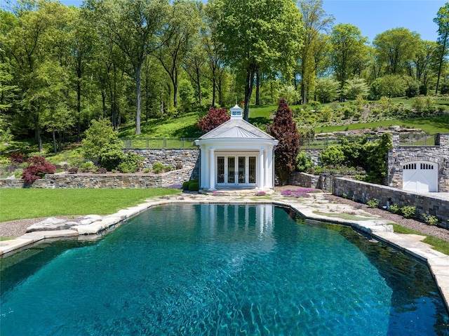 402 Sarles St, Bedford Corners, NY 10549 - swimming pool with an outbuilding, an exterior structure, french doors, and a patio area
