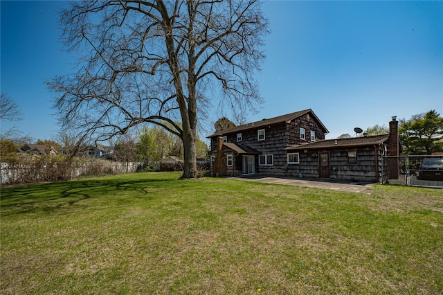 view of yard featuring a fenced backyard and a patio area