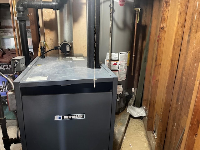 248-29 88th Rd, Bellerose, NY 11426 - utility room featuring a heating unit and gas water heater