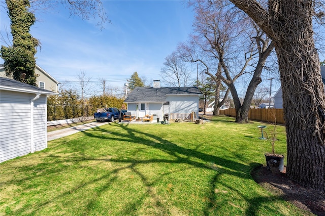 1760 Manatuck Blvd, Bay Shore, NY 11706 - view of yard featuring fence and driveway