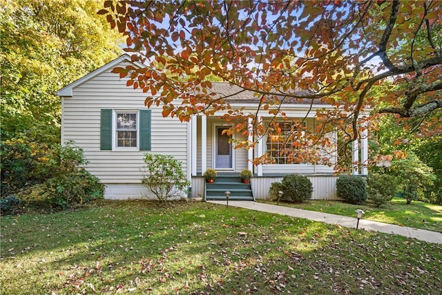 view of front of home with a front lawn