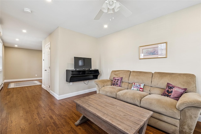living area featuring recessed lighting, baseboards, ceiling fan, and wood finished floors