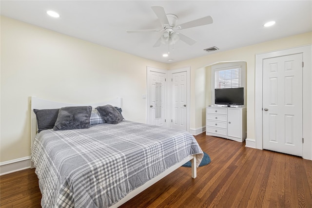 bedroom featuring visible vents, baseboards, recessed lighting, and wood finished floors