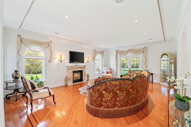 8 Tatem Way, Old Westbury, NY 11568 - living area with a fireplace with flush hearth, wood finished floors, crown molding, baseboards, and recessed lighting