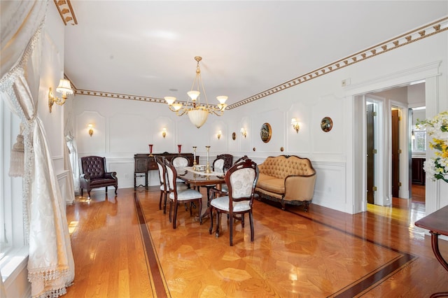 8 Tatem Way, Old Westbury, NY 11568 - dining space with a chandelier and a decorative wall