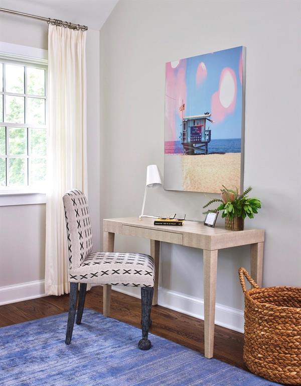 office with baseboards and wood finished floors