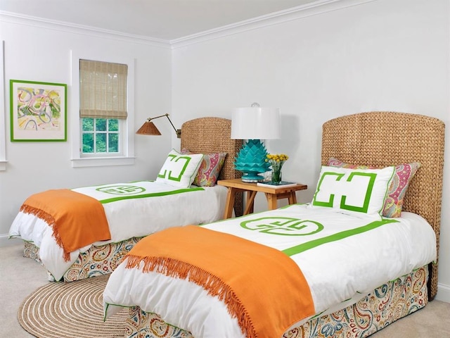 carpeted bedroom with baseboards and ornamental molding