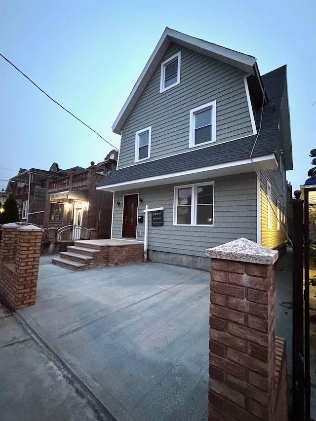 27-16 Mcintosh St, East Elmhurst, NY 11369 - view of front facade featuring a shingled roof