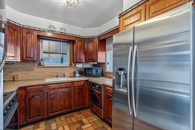 83-18 Parsons Blvd, Jamaica, NY 11431 - kitchen with stainless steel fridge with ice dispenser, a sink, decorative backsplash, light countertops, and gas range
