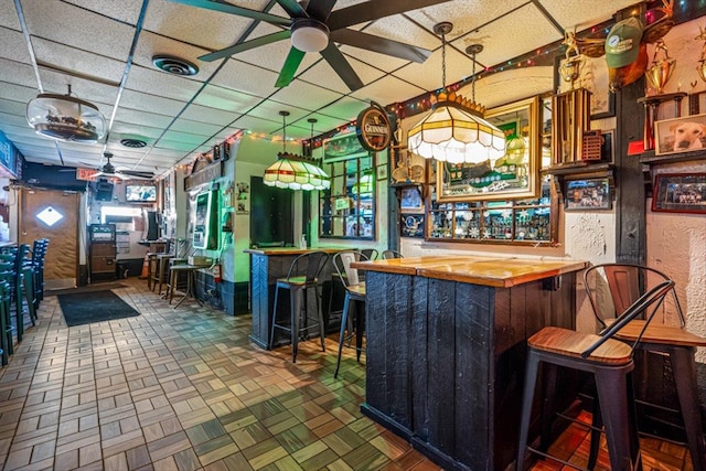 83-18 Parsons Blvd, Jamaica, NY 11431 - bar featuring a paneled ceiling, visible vents, wet bar, and ceiling fan