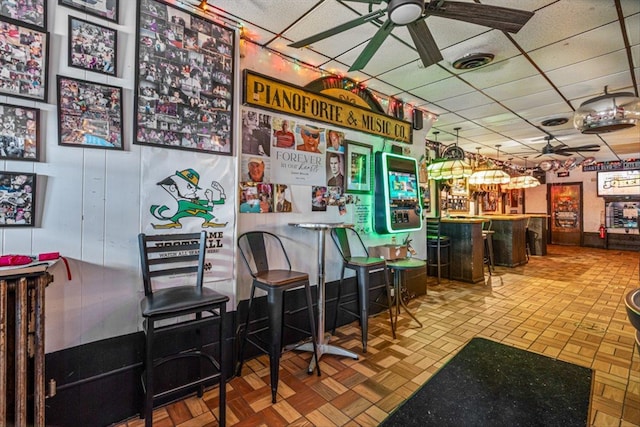 83-18 Parsons Blvd, Jamaica, NY 11431 - bar with visible vents, a dry bar, a ceiling fan, and a drop ceiling