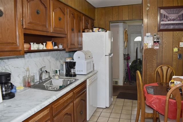 804 Commack Rd, Brentwood, NY 11717 - kitchen with a sink, white appliances, light tile patterned flooring, light countertops, and tasteful backsplash