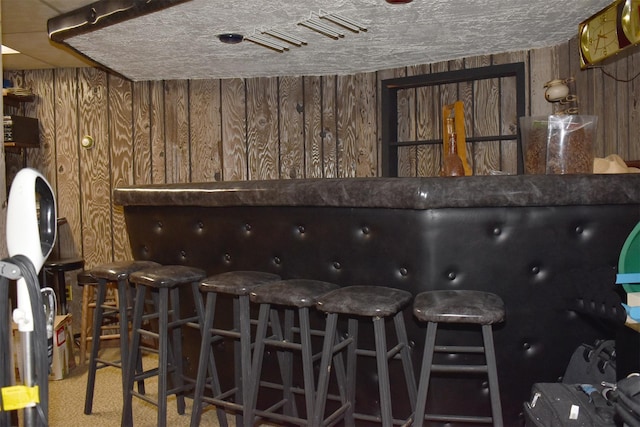 804 Commack Rd, Brentwood, NY 11717 - indoor dry bar featuring wood walls