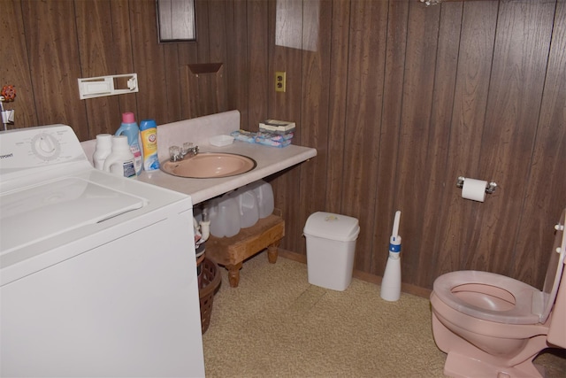 804 Commack Rd, Brentwood, NY 11717 - half bath featuring washer / dryer, wooden walls, toilet, and vanity