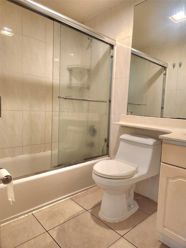 43-17 Union St Unit 2B, Flushing, NY 11355 - bathroom featuring tile patterned flooring, vanity, and bath / shower combo with glass door