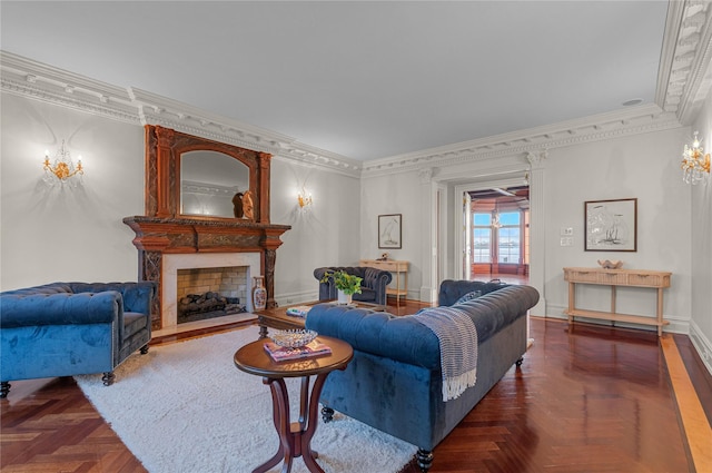 living room featuring crown molding, a fireplace, and baseboards
