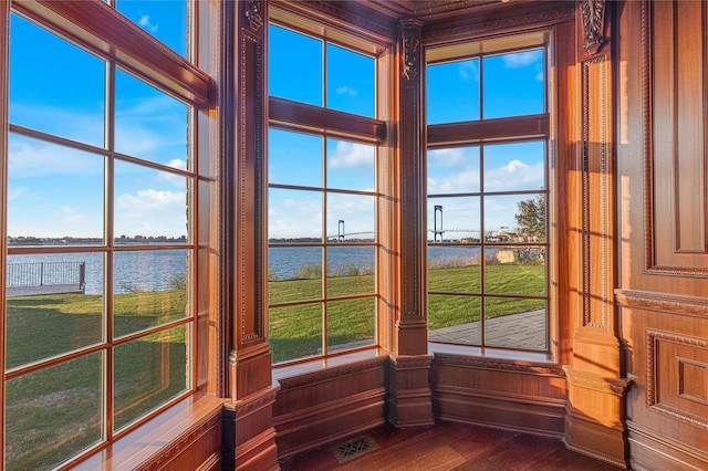 detailed view of a water view and wood finished floors