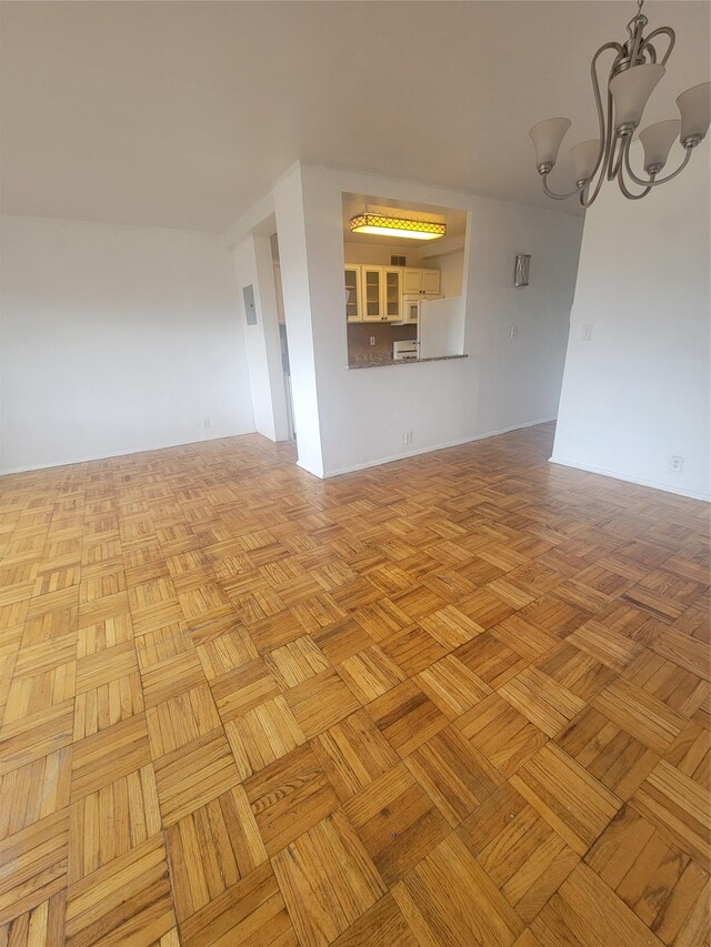 6 Fordham Hill Oval Unit 15F, Bronx, NY 10468 - empty room with a chandelier