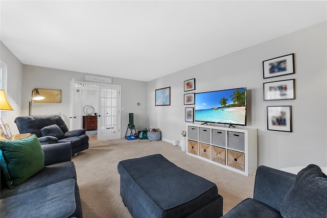 living room with baseboards and carpet
