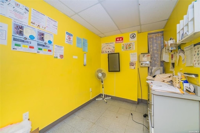 3440 Fulton St, Brooklyn, NY 11208 - workout area featuring light floors, baseboards, and a drop ceiling