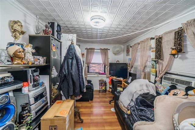 3440 Fulton St, Brooklyn, NY 11208 - bedroom featuring cooling unit, wood finished floors, and an ornate ceiling