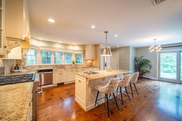10 Hickory Ln, Glen Cove, NY 11542 - kitchen with stainless steel appliances, a sink, healthy amount of natural light, tasteful backsplash, and recessed lighting