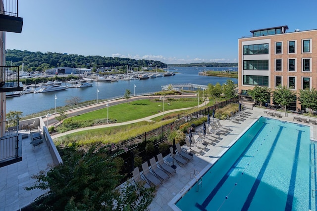 100 Garvies Point Rd Unit 1237, Glen Cove, NY 11542 - community pool featuring a water view