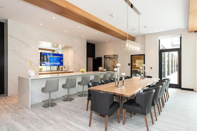 100 Garvies Point Rd Unit 1237, Glen Cove, NY 11542 - dining room featuring recessed lighting and a towering ceiling