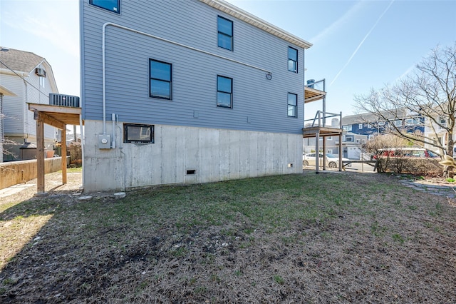 62 Rochester Ave, Long Beach, NY 11561 - back of property with fence and a lawn