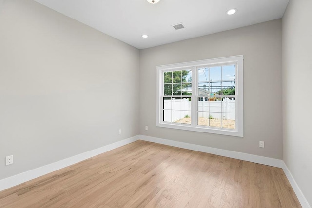 407 Wellington Rd, East Meadow, NY 11554 - spare room featuring baseboards, light wood-style flooring, and recessed lighting