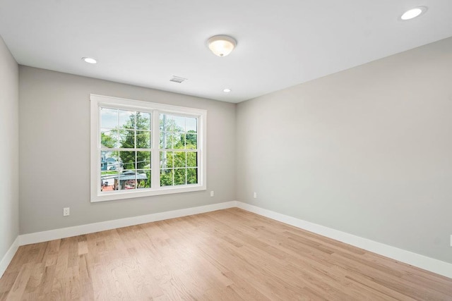 407 Wellington Rd, East Meadow, NY 11554 - spare room featuring baseboards, light wood-type flooring, and recessed lighting