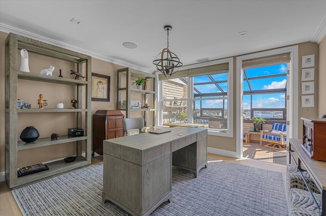31 Casino St Ph, Ph, Freeport, NY 11520 - office featuring a healthy amount of sunlight, ornamental molding, light wood-style flooring, and an inviting chandelier