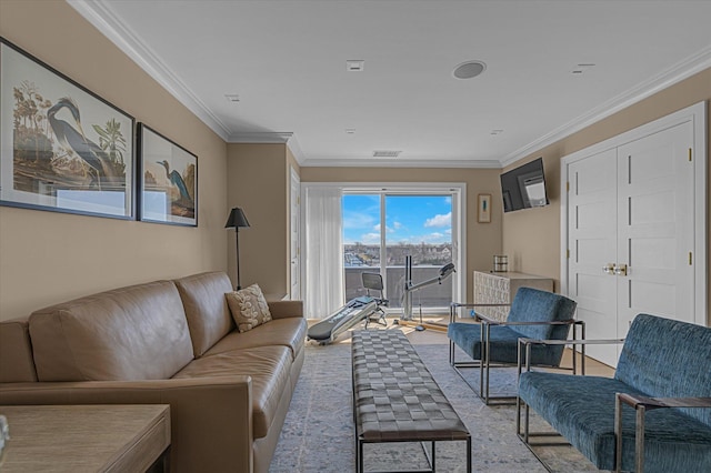 31 Casino St Ph, Ph, Freeport, NY 11520 - living area featuring visible vents, wood finished floors, and ornamental molding