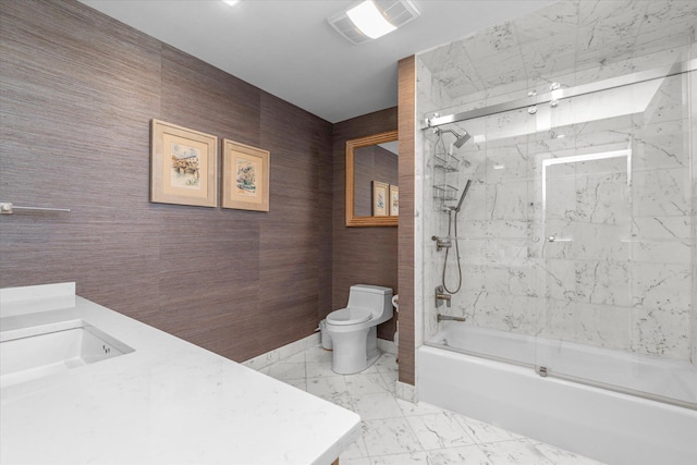 31 Casino St Ph, Ph, Freeport, NY 11520 - full bathroom with visible vents, bath / shower combo with glass door, marble finish floor, toilet, and vanity