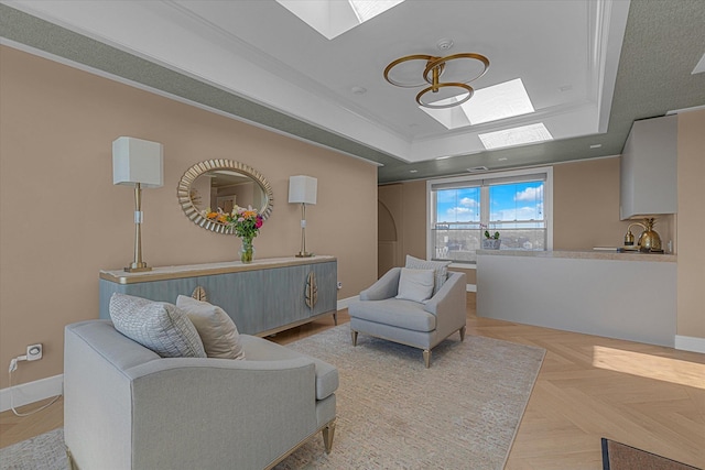 31 Casino St Ph, Ph, Freeport, NY 11520 - living area featuring a skylight, a tray ceiling, baseboards, and crown molding