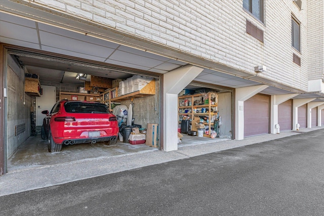 31 Casino St Ph, Ph, Freeport, NY 11520 - garage featuring a garage door opener