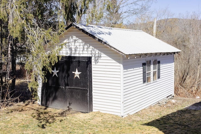 view of outbuilding with an outdoor structure