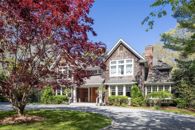 53 Cedar Ln W, Remsenburg, NY 11960 - shingle-style home with covered porch and a chimney