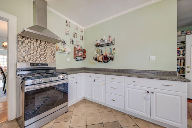 163 Simmons Ave, Call Listing Agent, NY 12047 - kitchen featuring stainless steel range with gas stovetop, wall chimney exhaust hood, ornamental molding, dark countertops, and white cabinets
